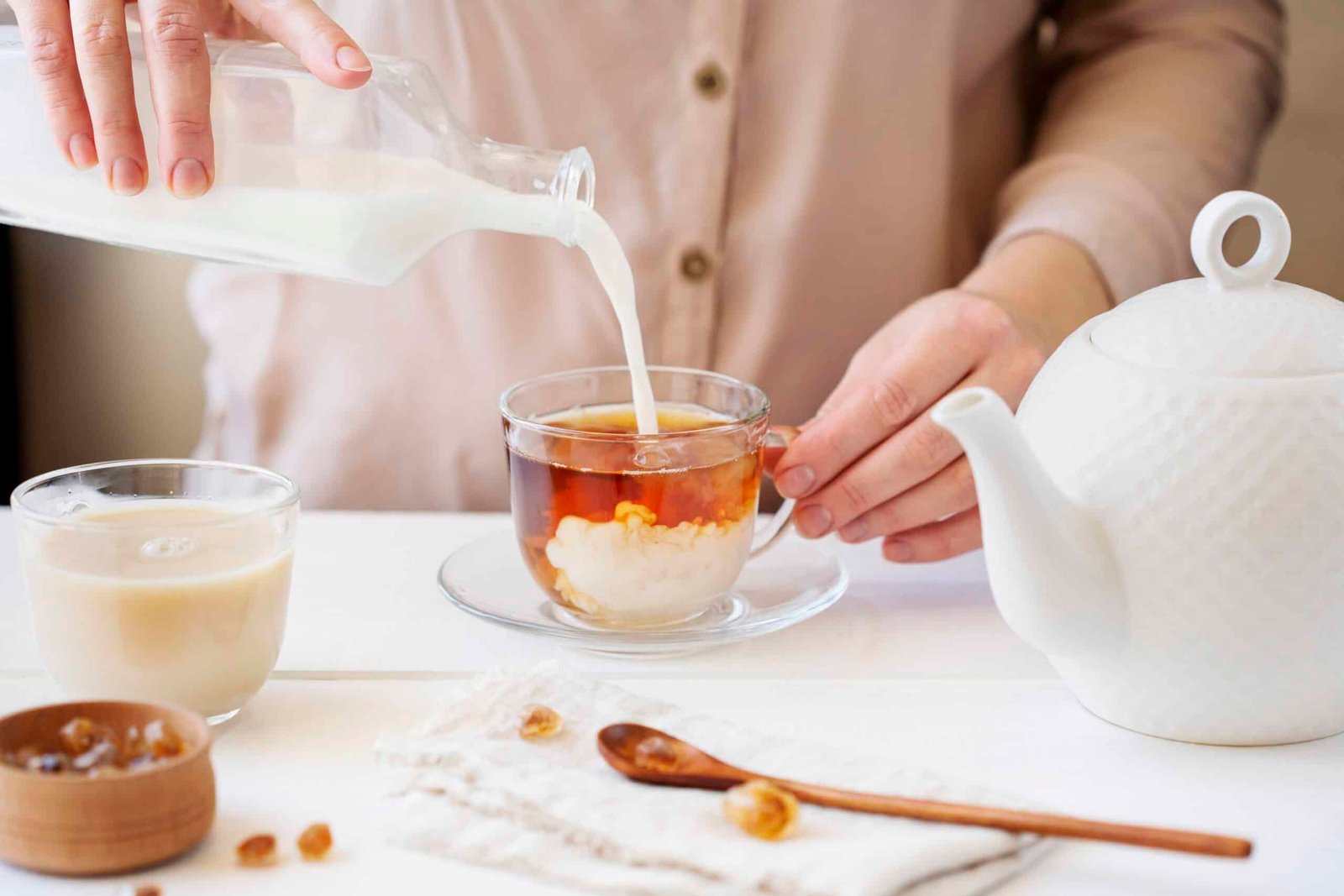 front view person preparing milk tea scaled