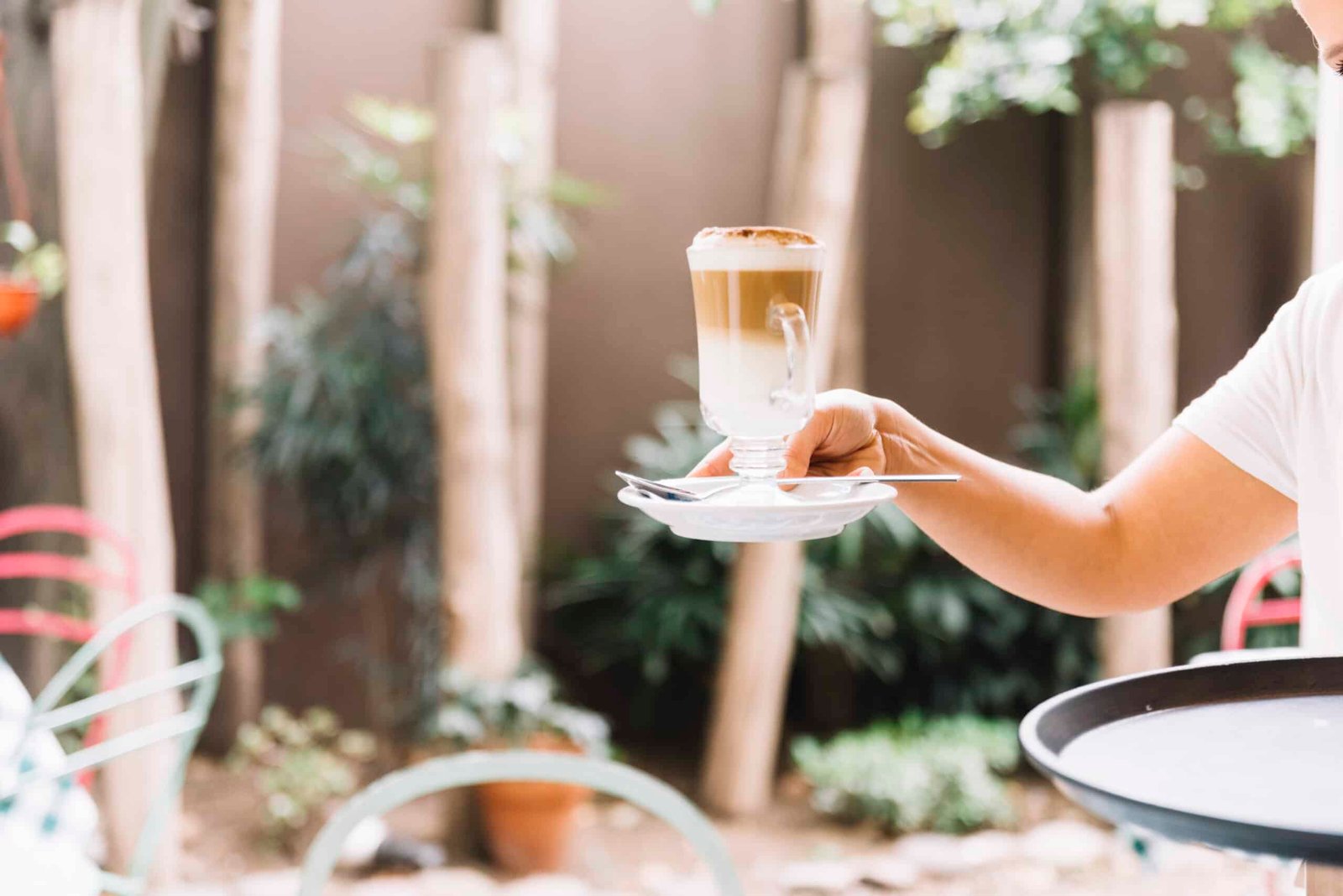 Best Cafes in Phrom Phong, Bangkok 1 waitress serving coffee scaled